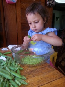 Leena shelling peas - mom's helper